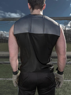 Back of Warrior Hill's original men's tank, with details on a pump pocket.